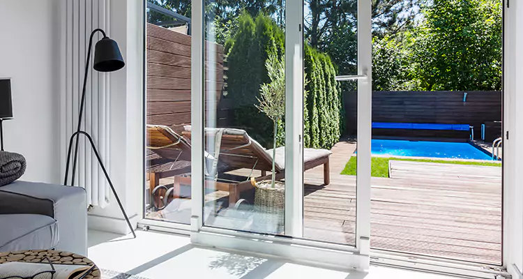 Fixing A Sliding Screen Door Roller in Pinewood, FL